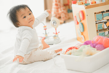 Curious Baby Playing with Educational Toys in Cozy Room