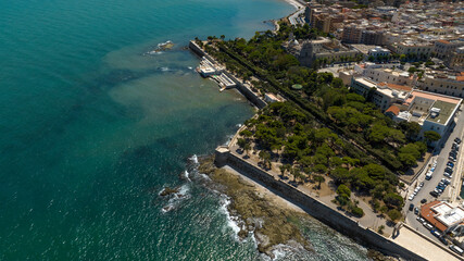 Aerial view of the municipal park of Trani, in Puglia, Italy. It is a small park located on the seafront of the city.