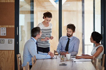 Discussion, brainstorming and team director with tablet, planning and project collaboration for ideas. Partnership, diversity and business people for creative, b2b and workshop for meeting in office