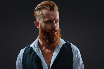 Bearded man with moustache isolated on grey. Mens beauty. Redhead brutal man portrait. Man with...