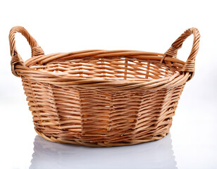 Fototapeta premium A close-up of an empty handcrafted woven basket set against a white background, highlighting its natural texture and traditional design. Ideal for storage, decoration, or gift presentation.