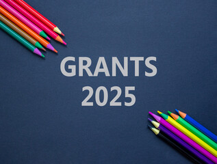 Planning grants 2025 new year symbol. Concept words Grants 2025 on beautiful black paper. Beautiful...
