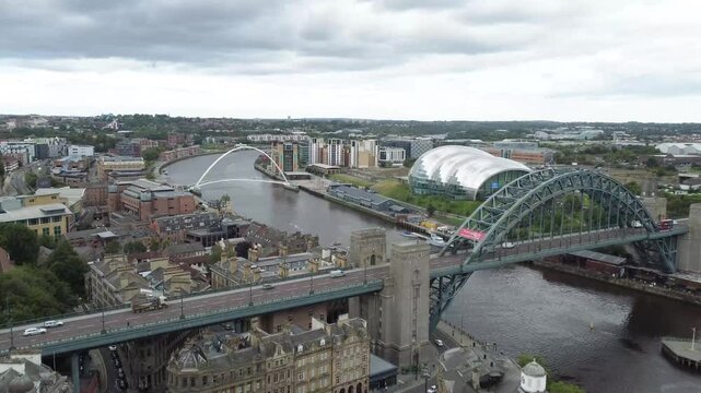 Newcastle Upon Tyne, United Kingdom - August 30th 2023: Dronefootage of bridges crossing the river Tyne.