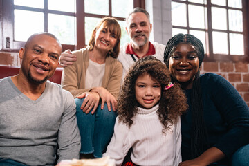 Celebrate Joyful Christmas Eve at Home, Happy Family Including a Smiling Father, Mother, and Children, Gather Together Around the Festively Decorated Tree, Sharing Love Excitement for New Year Gifts
