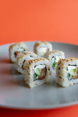 Sushi Rolls on Bright Colorful Background