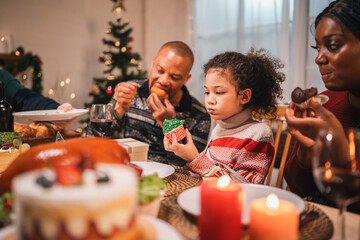 Celebrate Christmas at Home, Happy Family Dinner with Father, Mother, Children Gathered, Enjoying Festive Food Table Together, Smiling Embracing Joy of Holiday Season in a Warm Indoor Setting