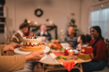 Celebrate Christmas at Home, Happy Family Dinner with Father, Mother, Children Gathered, Enjoying Festive Food Table Together, Smiling Embracing Joy of Holiday Season in a Warm Indoor Setting