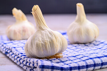 Fresh Garlic Bulbs on a Kitchen Towel