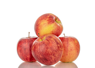 Several red apples, macro, isolated on white background.