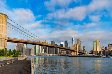 Architecture of historic bridge in Brooklyn. Way to Manhattan. Brooklyn bridge in New York. Manhattan cityscape. Amazing scenery of Brooklyn bridge over skyscraper in New York. NY city