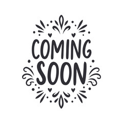 A white background with a black font that says "coming soon" in a cursive style. The font is surrounded by a floral design, giving the impression of a flowery, whimsical, and playful atmosphere