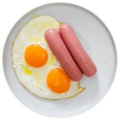 There is freshly cooked breakfast on plate - scrambled eggs with whole of fried pork chicken sausage. Traditional European Spanish breakfast is fried eggs with sausage. Isolated over white background