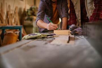 Carpenters working in their woodworking workshop