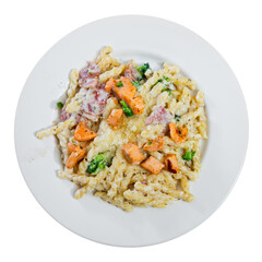 Plate of pasta cooked with salmon and bacon. Traditional Italian food. Isolated over white background
