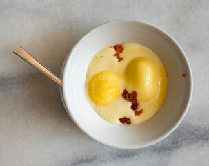 Delicious pineapple ice cream with cookie crumbs served for dessert