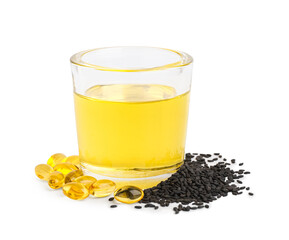 Sesame seeds and glass of oil on white background