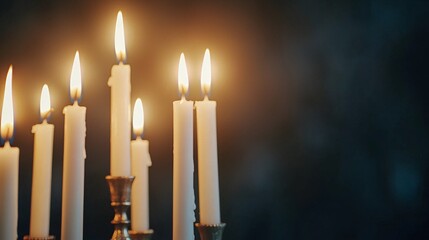 Elegant Candles Creating Warm Atmosphere in Dark Setting