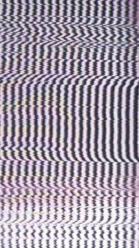 4K Vertical Vintage TV broadcast interference from early 90s Halloween TV. Glitchy horrorshow ghost noise closeup scrambled VHS cryptic haunted eerie distortions. Analog technology paranormal presence