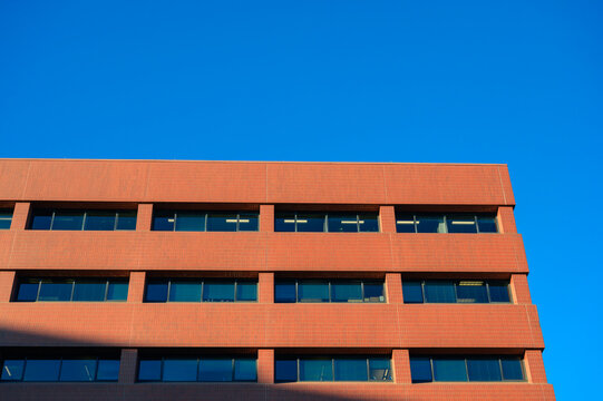 red brick building with blue sky