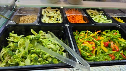 Vibrant Salad Bar with Fresh Vegetables and Toppings