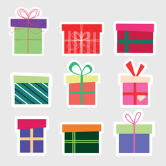 Set of gift boxes. Different colours gift boxes. Cute gift stickers. Red, green, purple, orange, pink gift boxes illustrations.