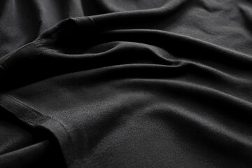 Fototapeta premium A detailed image of a black shirt, perfect for use in fashion or lifestyle photography