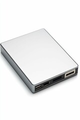 Silver external hard drive with ports.