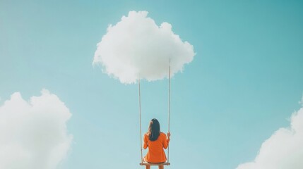 Businesswoman swinging on a cloud in a blue sky