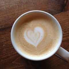 cup of coffee on wooden table