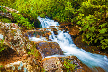 waterfall in mountains, amazing panoramic nature scenery