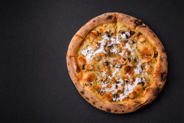 Creamy pizza with truffle cheese, mozzarella, chicken and mushrooms