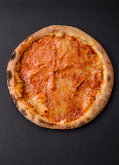 Pizza margherita with cheese, tomatoes, salt, spices and herbs