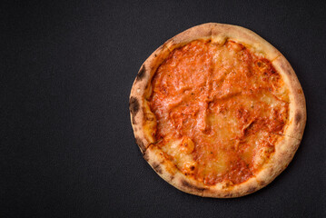 Pizza margherita with cheese, tomatoes, salt, spices and herbs