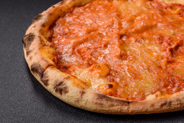 Pizza margherita with cheese, tomatoes, salt, spices and herbs
