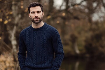 a man wearing a navy blue Cable Knit Cashmere Sweater,
