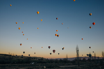 Colorful hot air balloons before launch in Goreme national park, Cappadocia, Turkey