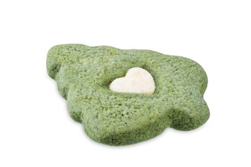 Green and yellow shortbread cookies for Christmas holidays on a white isolated background