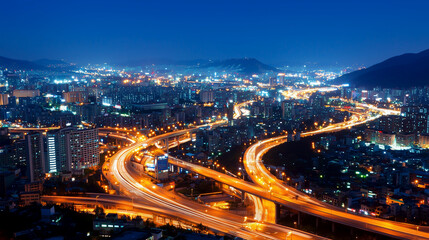 Aerial Night View of Urban Interchange with Traffic Lights