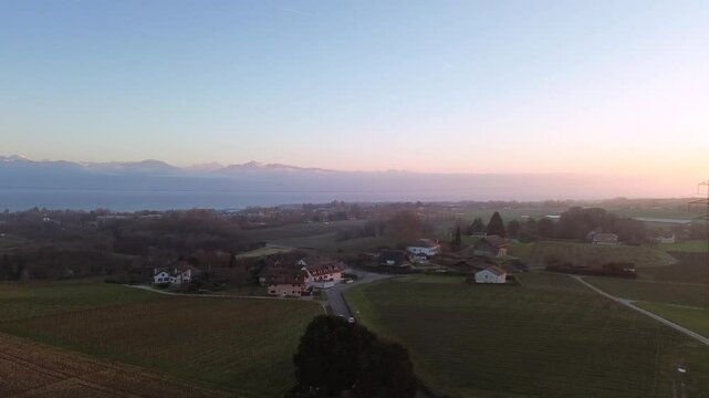 Aerial View of Swiss Countryside with Historic Castle Scenic Landscape. Stunning drone footage of a historic Swiss castle in the scenic countryside near Yverdon, Switzerland. for travel promotions.