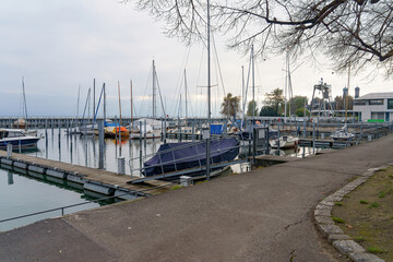 Boats and yachts moored in a private port.