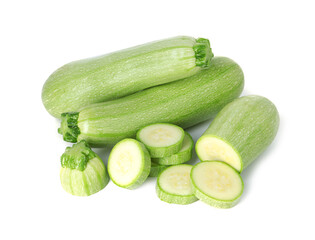 Fresh whole and cut zucchinis isolated on white
