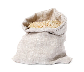 Raw rice in burlap isolated on white