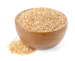 Dry wheat groats in wooden bowl isolated on white