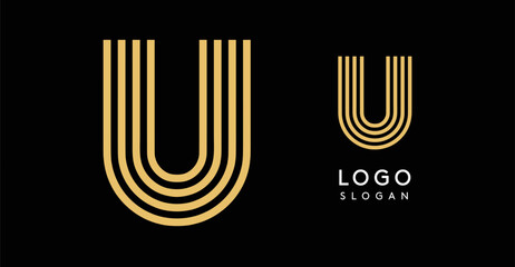 stylized golden letter U composed of concentric lines forming an elegant geometric logo on a black background