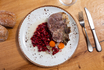 Delicious juicy fried pork belly with beans and stewed carrots