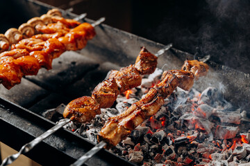 Juicy grilled skewers roasting over hot charcoal, perfect for BBQ lovers and summer gatherings