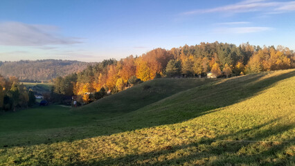 Green fields, hills and meadows. Landscape of Kashubia in autumn.