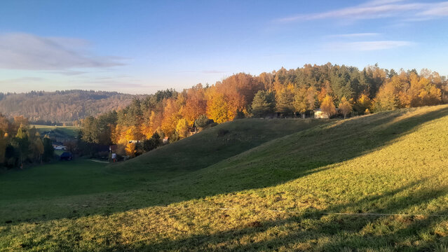 Green fields, hills and meadows. Landscape of Kashubia in autumn.