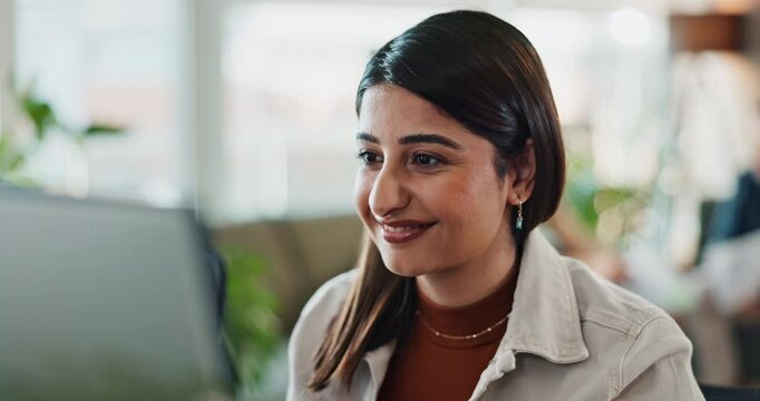 Computer, face and happy with business woman in office for administration, report or research. Programming, smile and reading with design employee in creative workplace for online web development