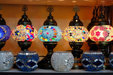 Ottoman style colorful mosaic lamps in souvenir store. Turkish mosaic lamps. Istanbul Grand Bazaar. Turkey.